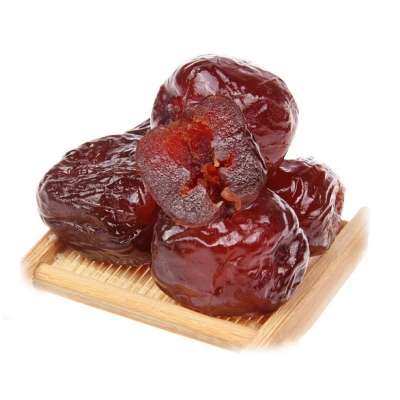 Dry candied red jujube fruit with golden dark brown